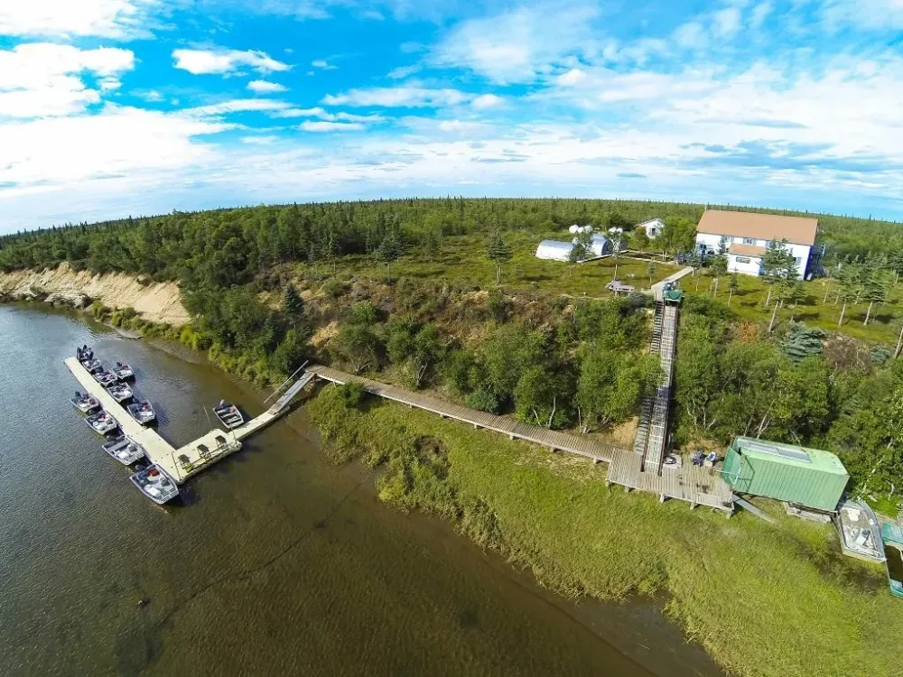 Guided wilderness freshwater fishing plus all-inclusive lodge accommodations. - 1