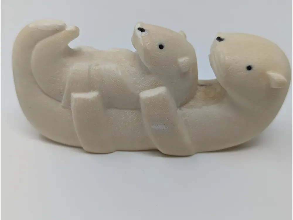 Carved Walrus Tusk - Laying Otter with Pup - 1