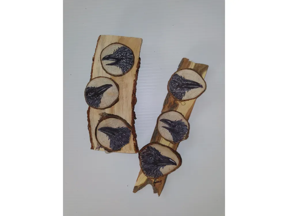 Miniature Raven paintings on salvaged wood