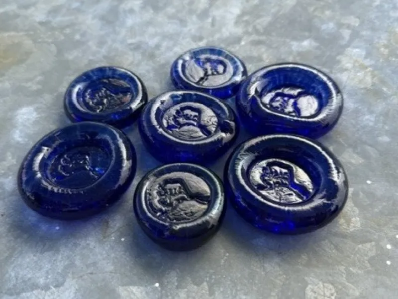Handblown Alaska stamped glass coins