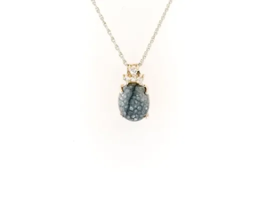 Alaska Sea Coral Oval Pendant With Diamond Cut White Sapphires