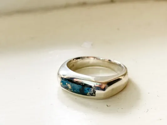 Star Of Alaska Covellite Women's Ring With Curved Rectangular Surface