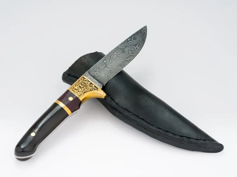 Hand Crafted Damascus Knife with Detailed Engraving