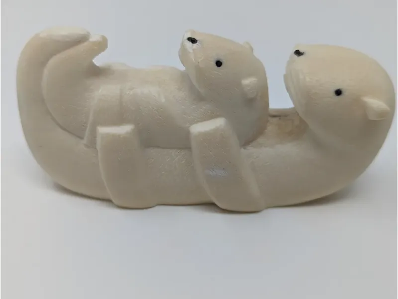 Carved Walrus Tusk - Laying Otter with Pup