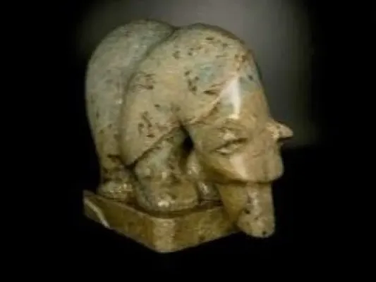 "Fishing Bear" Carving On A Soapstone by Ron Ekemo