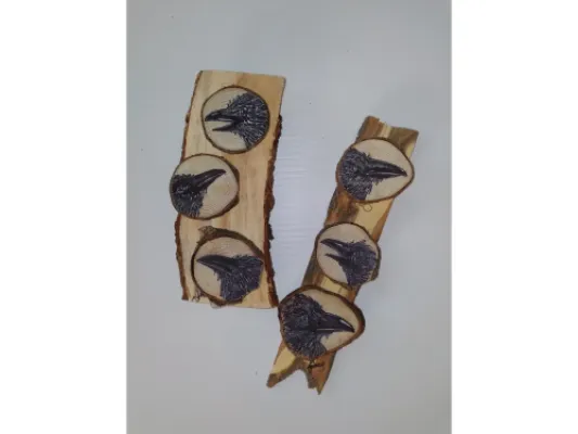 Miniature Raven paintings on salvaged wood