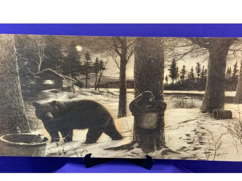 Bear with her Cubs Climbing on a Tree