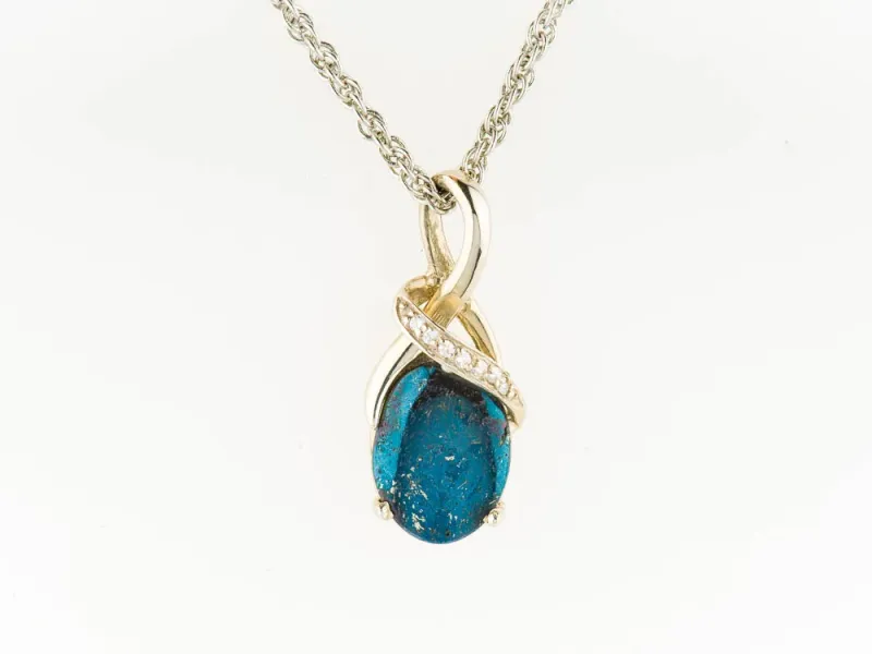 Star Of Alaska Oval Covellite Pendant With Twisted Frame