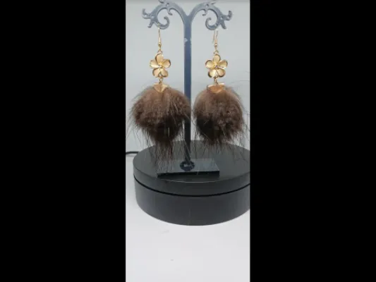 Mahogany beaver pom with gold plumeria