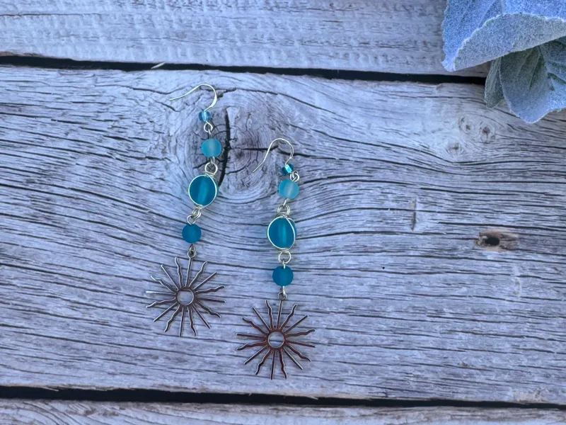 Beachcomber earrings with sun charm